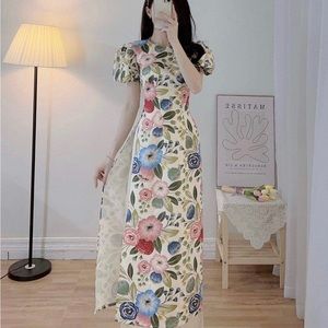 Modern Ao Dai with puff short sleeves! Size XL but fits size Medium (6-8)